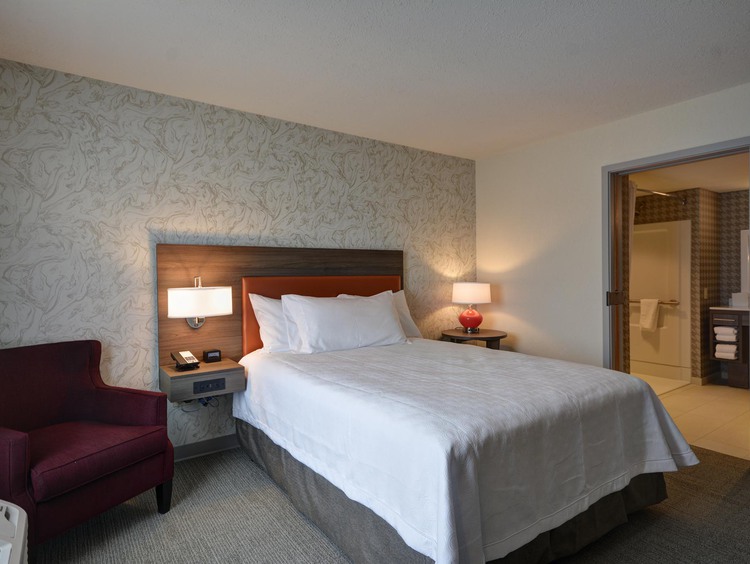 1 Queen Bed Accessible Roll in Shower Suite 